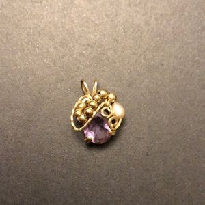 Purple stone pendant w/ gold wirework and beading